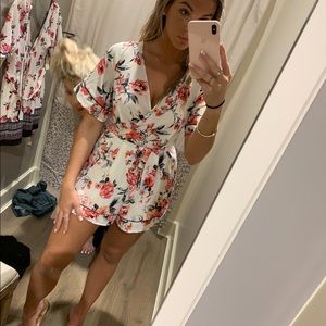 Floral romper willing to negotiate